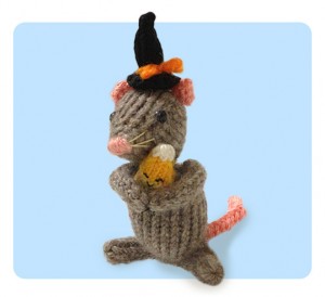 Knitted Mouse wearing a tiny witch hat 