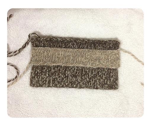 Knitted purse after blocking