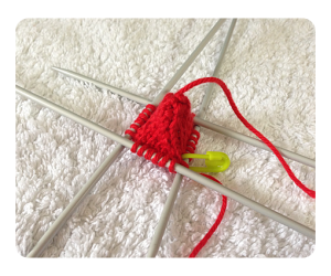 Strawberry knitting progression round 10